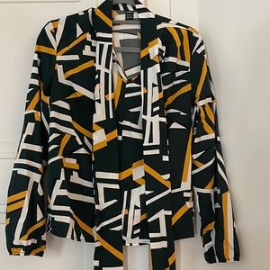 Cute Geo print tie neck blouse.